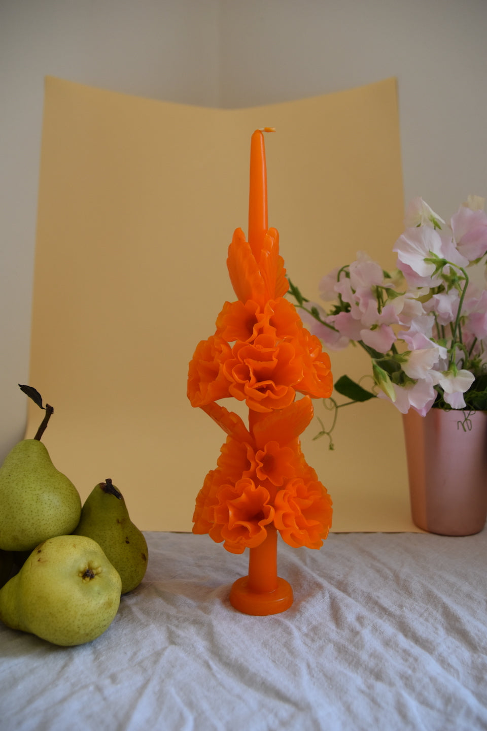 big FLOR candle in mandarina